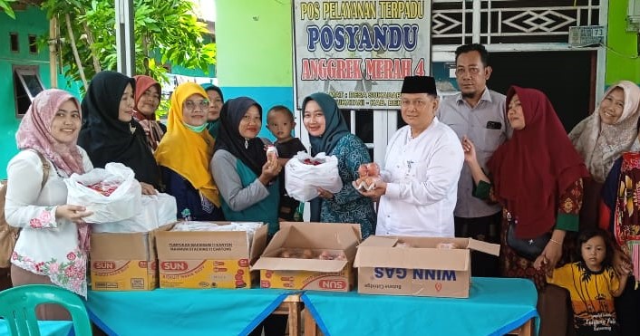 PKK Kecamatan Sukatani Salurkan Bantuan Paket PMT untuk Cegah Stunting