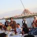 PJ Sekda Makassar Sambut Peserta KIM Fest 2024 dengan Sailing dan Dinner di Atas Phinisi
