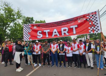 Polres Muara Enim Lakukan Pengawalan dan Pengamanan Jalan Sehat Sosialisasi Pilkada 2024