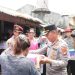Peduli Bencana, Polri Serahkan Ratusan Paket Sembako kepada Warga Candulan, Cipondoh Kota Tangerang