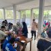 Bhabinkamtibmas Dampingi Penyaluran Pangan Non Tunai di Desa Sidodadi Berjalan Aman dan Kondusif